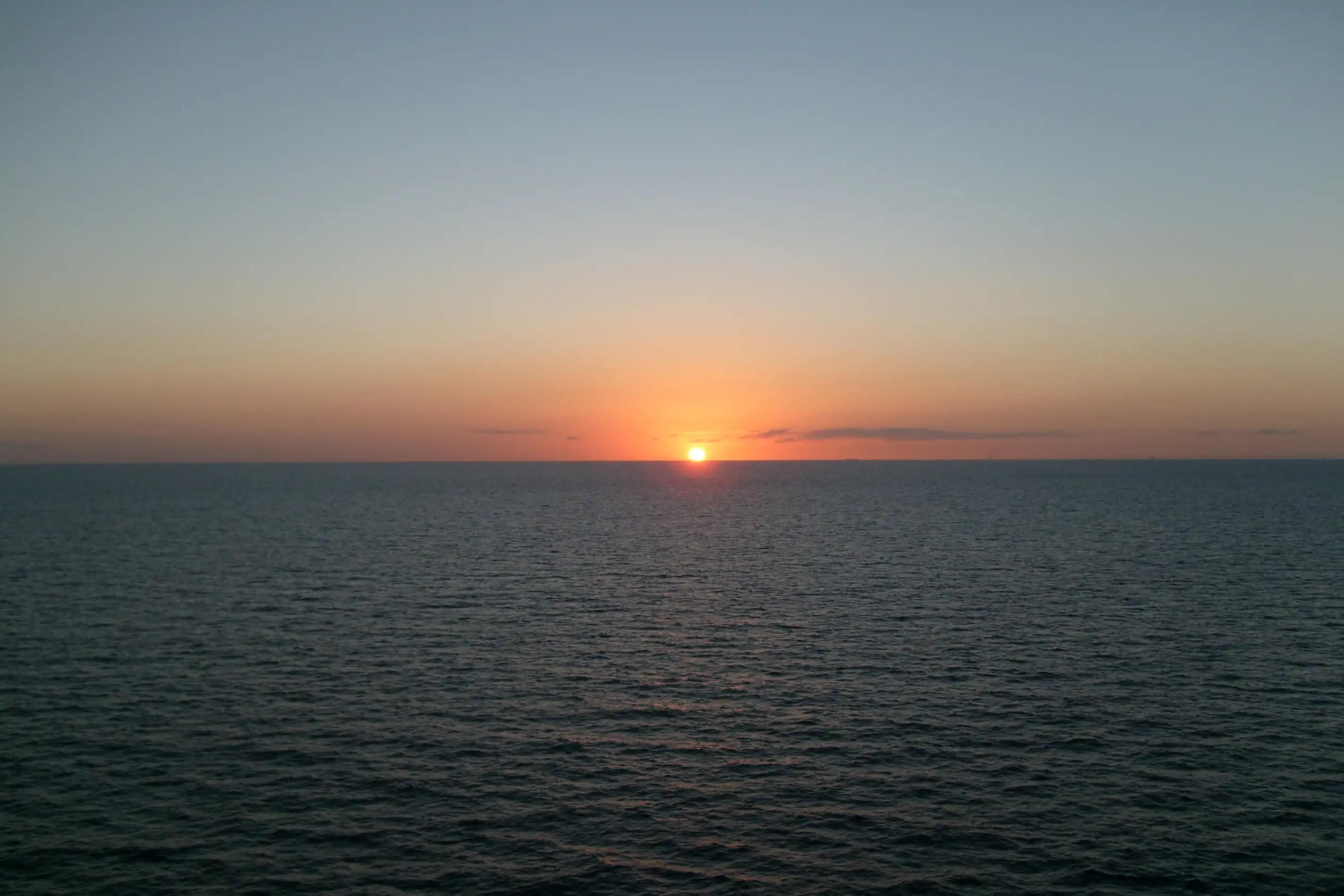 Sunset low over the ocean